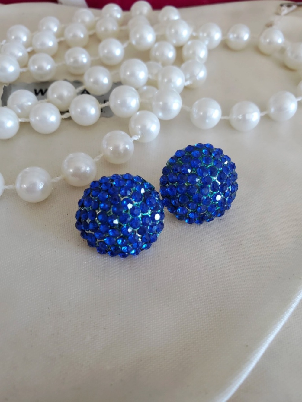 Rhinestone blue clip-on earrings in 1960s style